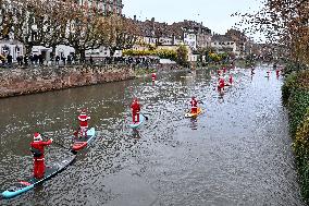 Santa Clauses Parade on Paddleboards - Strasbourg