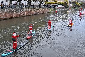 Santa Clauses Parade on Paddleboards - Strasbourg