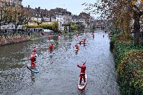 Santa Clauses Parade on Paddleboards - Strasbourg