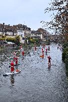 Santa Clauses Parade on Paddleboards - Strasbourg