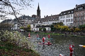 Santa Clauses Parade on Paddleboards - Strasbourg