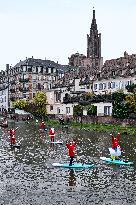 Santa Clauses Parade on Paddleboards - Strasbourg