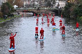 Santa Clauses Parade on Paddleboards - Strasbourg