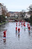 Santa Clauses Parade on Paddleboards - Strasbourg