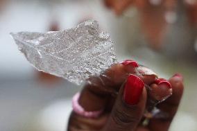 Freezing Rain Results In Surfaces Being Coated With A Sheet Of Ice In Toronto, Canada