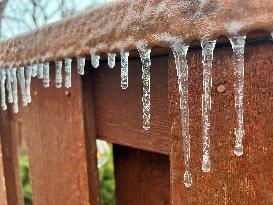 Freezing Rain Results In Surfaces Being Coated With A Sheet Of Ice In Toronto, Canada