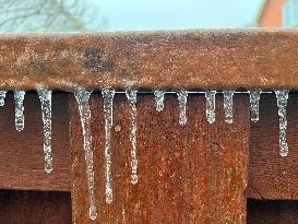 Freezing Rain Results In Surfaces Being Coated With A Sheet Of Ice In Toronto, Canada