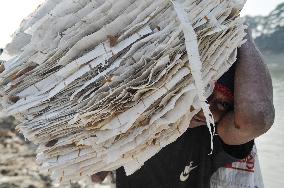 Cement Bags Washed In The Heavy Polluted Surma River - Bangladesh