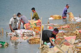 Cement Bags Washed In The Heavy Polluted Surma River - Bangladesh