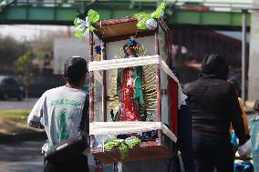 Pilgrims In Their Journey To The Basilica Of Guadalupe