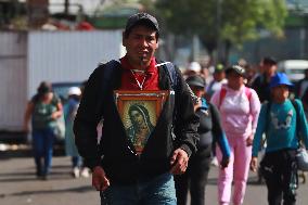 Pilgrims In Their Journey To The Basilica Of Guadalupe