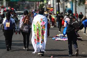 Pilgrims In Their Journey To The Basilica Of Guadalupe