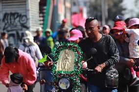 Pilgrims In Their Journey To The Basilica Of Guadalupe