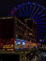 Munich At Night: Werksviertel With Illuminated Umadum Ferris Wheel