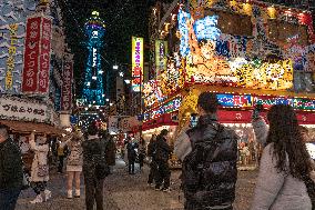 Tourists In Osaka Shinsekai, Japan.