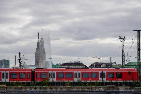 S-Bahn Train In Hamburg With Cityscape