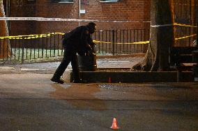 NYPD Evidence Collection Team Gathers Evidence Where Two People Were Shot At NYCHA Housing Complex In Bedford Stuyvesant Brookly