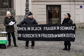 Women In Black Held A Vigil in Munich