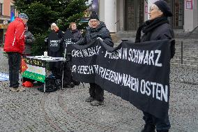 Women In Black Held A Vigil in Munich