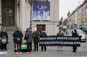 Women In Black Held A Vigil in Munich