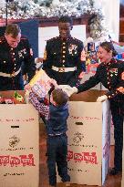 The First Lady Hosts A Toys For Tots Event.