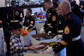 DC: First Lady Jill Biden hold a Marine Corps Reserve Toys for Tots event