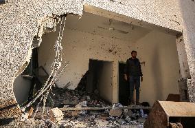 In Deir al-Balah People Search Through The Rubble Of Destroyed Homes