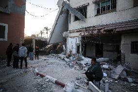 In Deir al-Balah People Search Through The Rubble Of Destroyed Homes