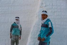 Mideast Egypt Quarry Workers