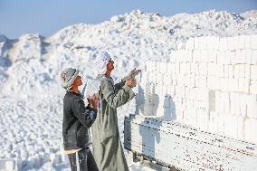 Mideast Egypt Quarry Workers