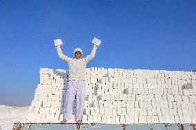 Mideast Egypt Quarry Workers