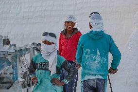 Mideast Egypt Quarry Workers