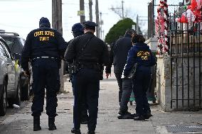 Philadelphia Police Crime Scene Unit Investigators At Scene Of Mass Shooting In Hunting Park Neighborhood In Philadelphia Pennsy