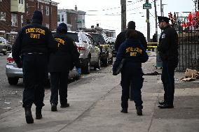 Philadelphia Police Crime Scene Unit Investigators At Scene Of Mass Shooting In Hunting Park Neighborhood In Philadelphia Pennsy