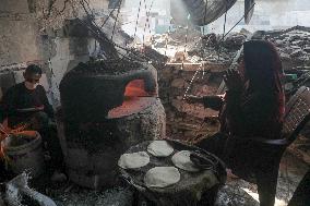 Palestinians Bake Bread - Gaza