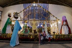 Residents Of Tláhuac, Mexico City, Visit Christmas Village