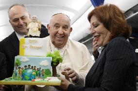 Pope Francis On Flight From Ajaccio To Rome