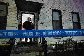 NYPD Crime Scene Investigators At Scene Of 32-year-old Woman Dead And A 49-year-old Man Wounded In A Shooting Inside Of A Buildi