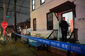 NYPD Crime Scene Investigators At Scene Of 32-year-old Woman Dead And A 49-year-old Man Wounded In A Shooting Inside Of A Buildi