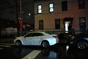 NYPD Crime Scene Investigators At Scene Of 32-year-old Woman Dead And A 49-year-old Man Wounded In A Shooting Inside Of A Buildi