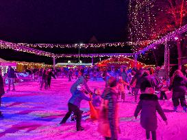 Ice Skating Under Festive Lights