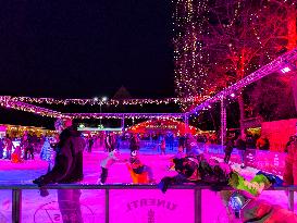 Ice Skating Under Festive Lights