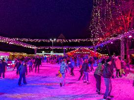 Ice Skating Under Festive Lights