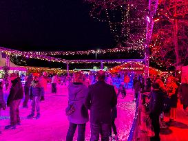 Ice Skating Under Festive Lights