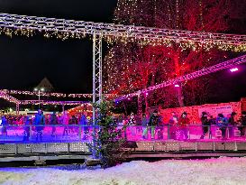 Ice Skating Under Festive Lights