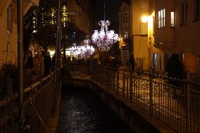 Festively Illuminated Narrow Streets In The Bavarian City Of Augsburg