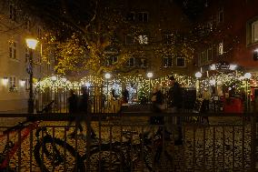 Festively Illuminated Narrow Streets In The Bavarian City Of Augsburg