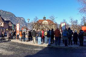 Travelers At Bus Stop At Garmisch-Partenkirchen Train Station