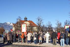 Travelers At Bus Stop At Garmisch-Partenkirchen Train Station