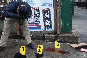 NYPD Crime Scene Investigators At The Scene Of 34-year-old Man Fatally Stabbed Outside Of Mucho Lucio Deli Grocery On Sutter Ave